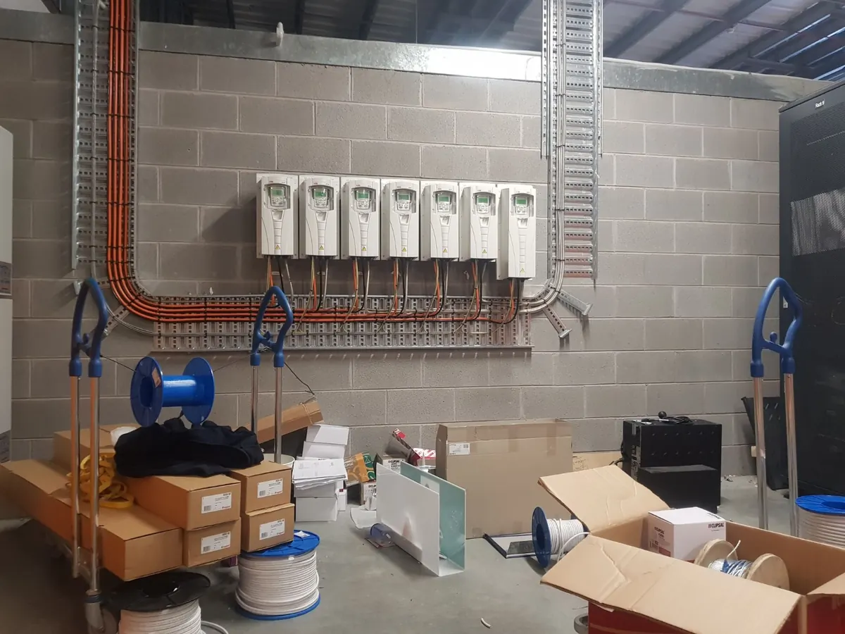Commercial electrical installation with multiple variable speed drives and cable tray