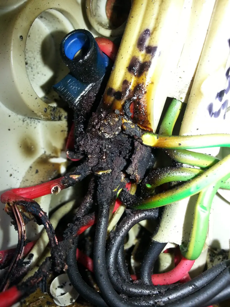 Heat-damaged electrical wiring discovered during electrical work