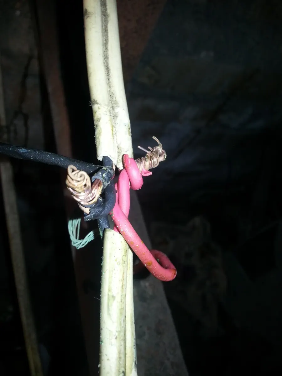 Exposed old electrical conductors discovered during electrical work