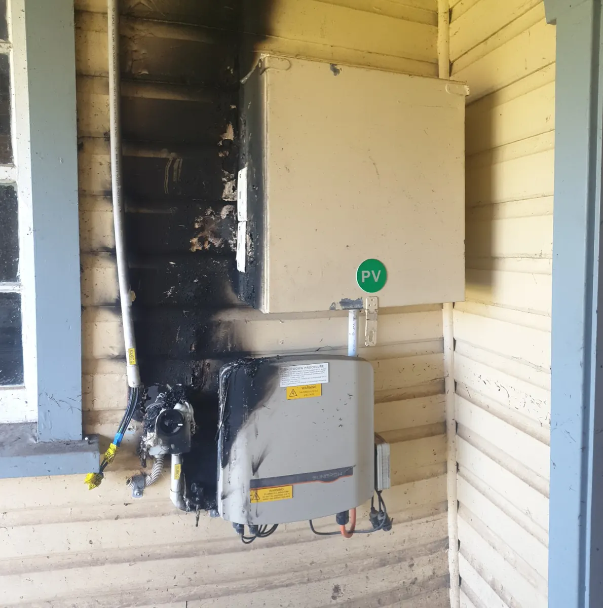 Electrical and solar equipment showing significant fire damage